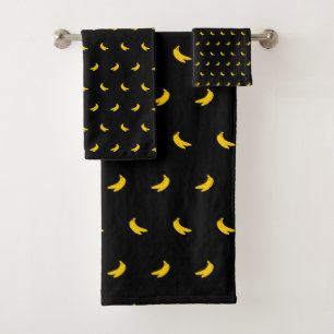 Silhouettes de petites bananes jaunes sur le noir