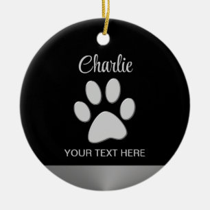 Silver Dog Paw auf schwarzem Hintergrund Keramik Ornament