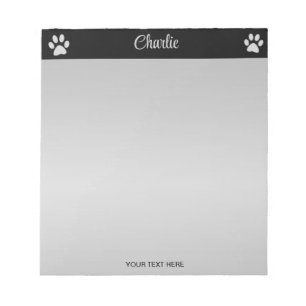 Silver Dog Paw auf schwarzem Hintergrund Notizblock