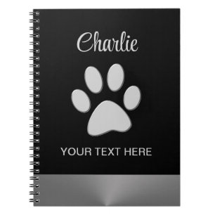 Silver Dog Paw auf schwarzem Hintergrund Notizblock