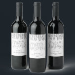 Silver Foil Effect Typography Merry Christmas Weinetikett<br><div class="desc">Dekorieren Sie Ihr Weihnachtsfest in dieser Urlaubssaison mit diesen einzigartigen und modernen Weihnachtsflaschen-Etiketten. Das Design zeichnet sich durch ein festliches Silberfolieneffekt-Typografie-Skript "Frohe Weihnachten" mit passendem hängendem Blattwerk auf einem sauberen, weißen Hintergrund aus. Fügen Sie einfach Ihre individuelle Formulierung zu diesen Feiertagslabeln hinzu, indem Sie den Abschnitt "Diese Designvorlage bearbeiten" verwenden,...</div>