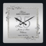 Silver Gem & Glitter 25th Wedding Anniversary Quadratische Wanduhr<br><div class="desc">Glamorous and elegant posh 25th Silver Wedding Anniversary wall clock with stylish silver gem stone jewels corner decorations and matching colored glitter border frame. A romantic design for your celebration. All text, font and font color is fully customizable to meet your requirements. If you would like help to customize your...</div>