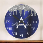 Silver Navy Blue Glitter Brushed Metal Monogram Große Wanduhr<br><div class="desc">Silver and Navy Blue Faux Foil Metallic Sparkle Glitter Brushed Metal Monogram Name and Initial Luxury Wall Clock. This makes the perfect sweet 16 birthday,  wedding,  bridal shower,  anniversary,  baby shower or bachelorette party gift for someone that loves glam luxury and chic styles.</div>