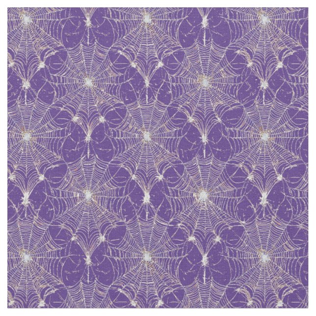 Silver Spiderweb Lace auf Lila Stoff (Nahaufnahme)