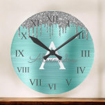 Silver Teal Glitter Brushed Metal Monogram Name Runde Wanduhr<br><div class="desc">Silver and Teal Aqua Blue Scheinfoil Metallic Sparkle Glitter Brushed Metal Monogram Name and Initial Luxury Wall Clock. This makes the perfect sweet 16 birthday,  wedding,  bridal shower,  anniversary,  baby shower or bachelorette party gift for someone that loves glam luxury and chic styles.</div>
