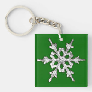 Silver & White Schneeflocke auf Kieferngrün Schlüsselanhänger