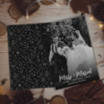 Simple Black & White Merry And Married Photo       Feiertagskarte<br><div class="desc">A very elegant chic newlyweds Christmas photo holiday card. That features whimsical calligraphy of merry and married and under it merry Christmas. With customizable names .And in the back the card we got a modern black and white pattern. And as you see this card is minimal elegant very impressive. So...</div>