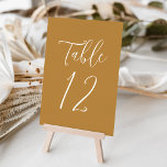 Simple Script Ochre Wedding Tischnummer<br><div class="desc">Elegante Hochzeitsszenarien mit der Tischnummer, die in einem einfachen, weißen Drehbuch mit ockerfarbenem Hintergrund angezeigt wird. Die Text- und Hintergrundfarben können mithilfe der Editierwerkzeuge auf Ihre Hochzeitsfarben geändert werden. Um diese Tischkarten zu bestellen, editieren Sie die Karte individuell mit der Nummer und fügen Sie sie Ihrem Warenkorb hinzu. Wiederholen Sie...</div>