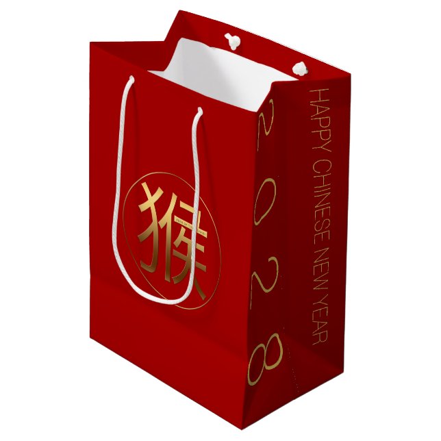 Singe Année 2028 Symbole en or M Sac cadeau (Devant Angle)