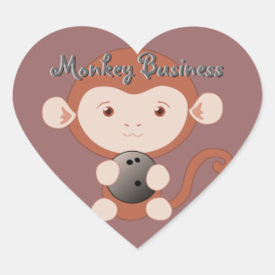 Singe avec des autocollants de coeur de boule de