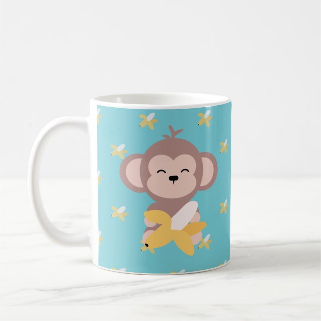 Singe mignon de Kawaii avec la tasse de banane (Gauche)