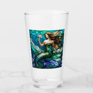 Sirène en verre tendu admirant une fleur
