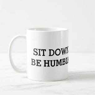 Sitzen Sie sich hin. Seien Sie bescheiden. Tasse