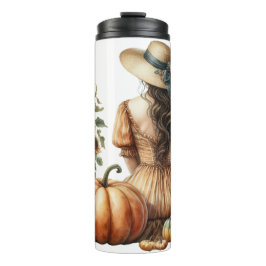 SITZENDE FRAU MIT EINER HAT & FALL-PUMPKINE THERMOSBECHER