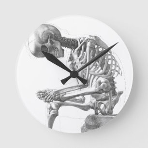 Sitzendes vintage Skelett beim Nachdenken Runde Wanduhr