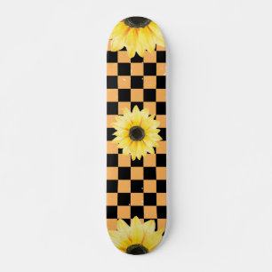 Skateboard à damiers et tournesol orange et noir