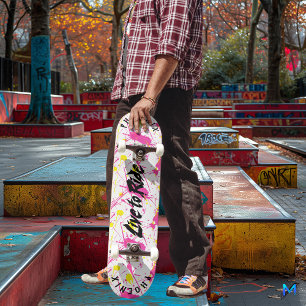 Skateboard Graffiti lumineux avec la devise "Live to Ride" en