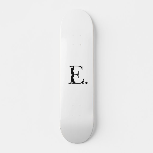 Skateboard lettre E à motifs floraux (Devant)