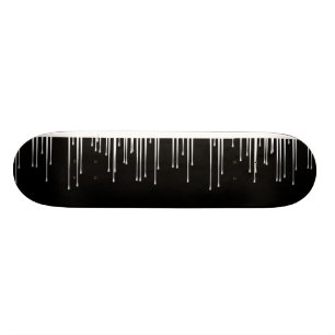 Skateboard Noir sur les égouttements blancs de peinture