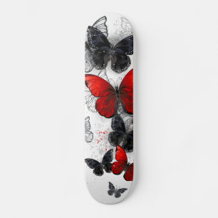 Skateboard Papillons noirs et rouges volants