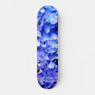 Skateboard Zorangées de Tanzanite, fleurs de magenta bleu vio