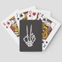 Skeleton Hand macht ein Friedenszeichen auf einem