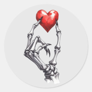 Skeleton Hand Pinching Rotes Herz Runder Aufkleber