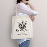 Skeleton Roses Bride or Die Bachelorette Party Tragetasche<br><div class="desc">Set the tone for your unique celebration with our Skeleton Roses Bride or Die Bachelorette Party Tote Bag. This gothic design features a skeleton with elegant floral accents, perfect for ladies who embrace a darkly romantic aesthetic. Invite your closest friends to join in the celebration of love and friendship with...</div>