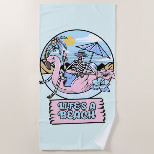 Skelett-Flamingo-Schwimmkörper am Strand des Leben Strandtuch