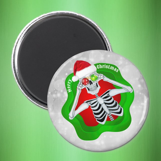 Skelett Weihnachtsgeschmuck Spritzer Form Kreis Magnet (Fun Skeleton ornament Eyes Santa hat white circles on Merry Christmas magnet.)
