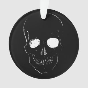 Skelettkopf mit leuchtenden Augen auf einem Ornament