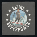 Skifahren ist meine Supermacht Steinuntersetzer<br><div class="desc">Funny Winter Ski Sport Illustration,  zeigt Berggrafik und eine Frau auf Ski,  und das Sprichwort: Ski ist meine Supermacht und kleine Sterne. Dies ist das ideale Geschenk für alle,  die Ski fahren,  Berge und Wintersport Lieben.</div>