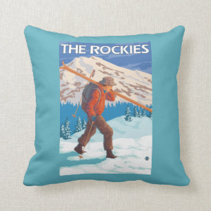 Skifahrer-tragende Schnee-Skis - die Rockies Kissen