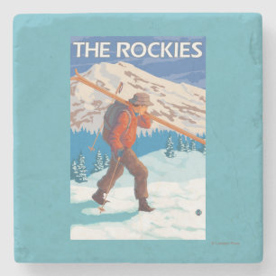 Skifahrer-tragende Schnee-Skis - die Rockies Steinuntersetzer