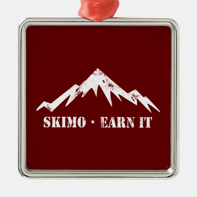 Skimo, verdiene es ornament aus metall (Vorne)