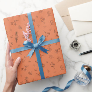 Skizzierte Wildblumen auf Orange Geschenkpapier