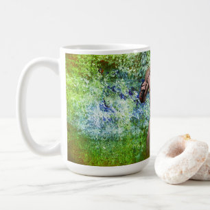 SlipperyJoe's hochmuskelbiger erwachsener Mann obe Kaffeetasse