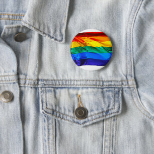 SlipperyJoe's schwule Regenbogenflagge weht rot or Button