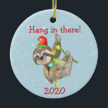 Sloth Hang in There Christmas Pandemic 2020 Keramik Ornament<br><div class="desc">This design was created though digital art. It may be personalized in the area provide or customizing by choosing the click to customize further option and changing the name, initials or words. You may also change the text color and style or delete the text for an image only design. Kontakt...</div>