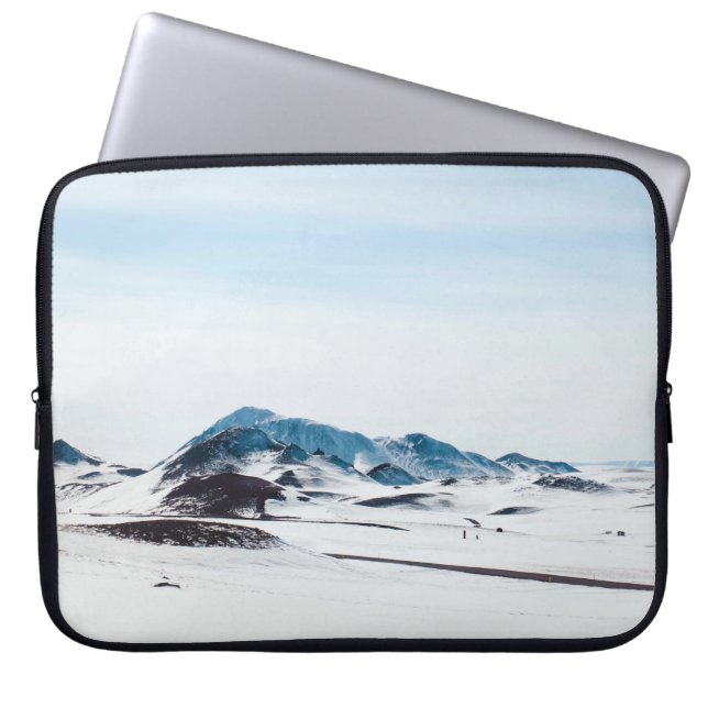 SNOW-COVERED LAND DURING DAY TIME LAPTOPSCHUTZHÜLLE (Vorderseite)