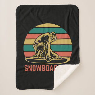 Snowboarden mit Snowboarder. Sherpadecke