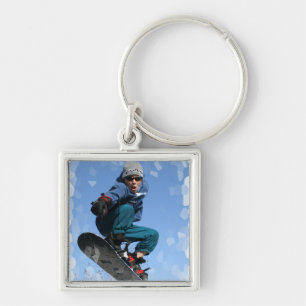 Snowboarder im Schnee-Schlüsselanhänger Schlüsselanhänger
