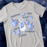 Snowman Dreidels Funny 8 Crazy Nights Hanukkah Tri-Blend Shirt<br><div class="desc">Personalisieren Sie diesen lustigen Hanukkah T - Shirt als niedliches Geschenk oder vielleicht für sich selbst! Ein glücklicher jüdischer Schneemann weht im Zentrum des Designs hallo, mit sieben passenden blauen und lila dreidimensionalen Drähten unterschiedlicher Größe tanzen um ihn herum. Unter den dreiköpfigen sind Wörter in einem dunkelblauen, handgeschriebenen Schriftart untergebracht:...</div>