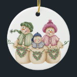 Snowman Family Keepake Ornament<br><div class="desc">Eine Schneefamilie mit herzförmigen Kränzen auf einem Porzellanschmuck wird bestimmt jeden begeistern,  der Schneemänner und Winterschnee Lieben!</div>