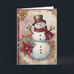 Snowman Junk Journal Page Christmas Karte<br><div class="desc">Auf einer Junk-Journalseite,  die aus Blume und Blätter,  Zeitungen,  Texten und kleinen Schneemarken besteht,  überlagert sich ein Hut- und Schneemann,  der auf dieser bezaubernden Urlaubskarte einen Hut und Schal bewundert.</div>