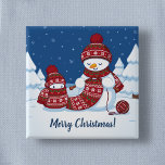 Snowman Knitting Christmas Scarf Button<br><div class="desc">Cartoon illustration of two adorable snowmen dressed in knitted hats and scarves. The big snowman is knitting an oversized scarf for the little one. The scarf is already wrapped several times around the cute little snowman.</div>