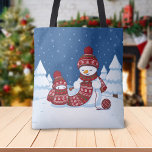 Snowman Knitting Christmas Scarf Tasche<br><div class="desc">Cartoon illustration of two adorable snowmen dressed in knitted hats and scarves. The big snowman is knitting an oversized scarf for the little one. The scarf is already wrapped several times around the cute little snowman.</div>