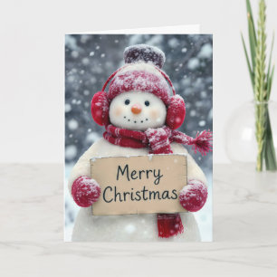 Snowman mit einem fröhlichen Weihnachtszeichen Karte