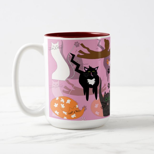 So unterschiedliche Katzen. Zweifarbige Tasse (Links)