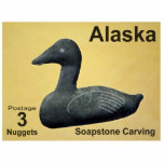 Soapstone Eider Duck - Alaska Postage Fotoskulptur Magnet<br><div class="desc">A postanage stamp from a mythical independent Alaska featuring a soapstone carving of an Eider Duck. Text Reading, "Alaska, " "Postage 3 Nuggets, " und "Spastone Carving" also appears. The Common Eider, Somateria mollissima, is the largest duck found in Europe and in North America (ausnahmsweise für die Muscovy Duck which...</div>